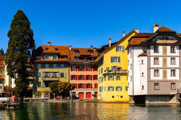 Fototapeta na wymiar Architecture on the river Reuss in Lucerne, a city in the German-speaking part of Switzerland