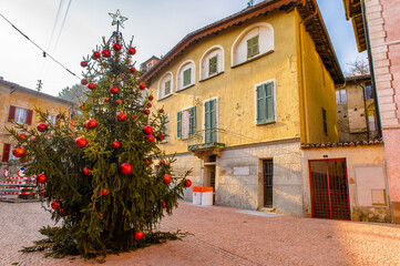Fototapeta na wymiar It's Christmas tree in Carona, a former municipality in the district of Lugano in the canton of Ticino in Switzerland