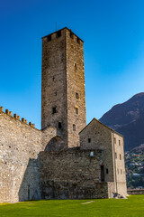 It's The Torre Bianca (White tower) of the Castelgrande in Bellinzona, Switzerland. UNESCO WOrld Heritage sign