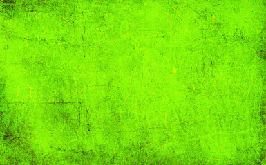 Green scraped texture. Green grungy wallpaper. Dark green desktop image. Green abstract abraded pattern.