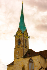 Fototapeta na wymiar Clock tower of Fraumunster Church (Lady Minster Church), Zurich, Switzerland