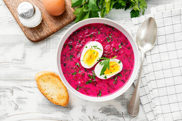 Summer Cold beetroot soup with fresh vegetables and boiled egg.