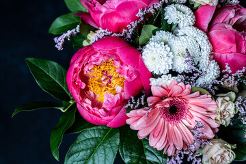 Fresh bouquet of peonies. Moody flower. Bright flower background. 