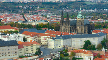 Aerial view of the Old Town architecture with red roofs in Prague , Czech Republic. St. Vitus Cathedral in Prague.