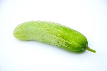 the ripe green cucumber isolated on white background