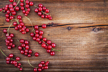  Red Currants on wooden background
