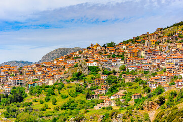 It's Houses of Arachova, Greece. A village on the green slopes of Parnassus Mountains, Greece
