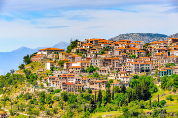It's Aerial panoramic view of Arachova, Greece. A village on the green slopes of Parnassus Mountains, Greece