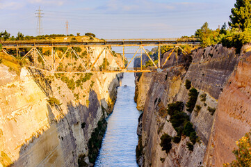 It's Corinth Canal, a canal that connects the Gulf of Corinth with the Saronic Gulf in the Aegean Sea.