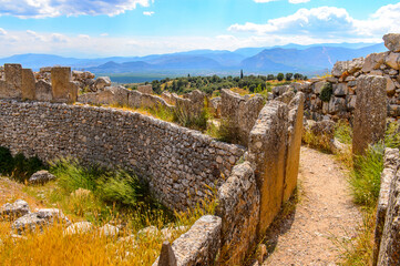 Fototapeta premium It's Walls of Mycenae, center of Greek civilization, Peloponnese, Greece. Mycenae is a famous archaeological site in Greece. UNESCO World Heritage Site