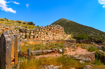 Fototapeta na wymiar It's Walls of Mycenae, center of Greek civilization, Peloponnese, Greece. Mycenae is a famous archaeological site in Greece. UNESCO World Heritage Site