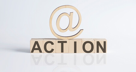 Wooden Blocks with the text: Action with wooden sign e-mail