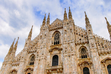 Fototapeta na wymiar It's Duomo di Milano (Dome of Milan), Milan, Italy. Metropolitan Cathedral-Basilica of the Nativity of Saint Mary