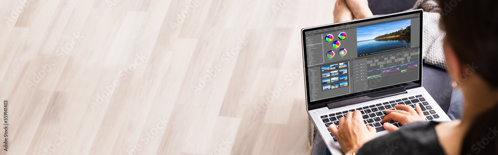 Poster video editor software on laptop computer