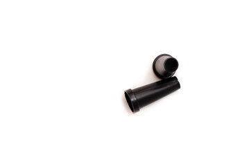 Mouthpiece for a hookah pipe on a white background and in hand in close-up. Mouthpiece for individual use