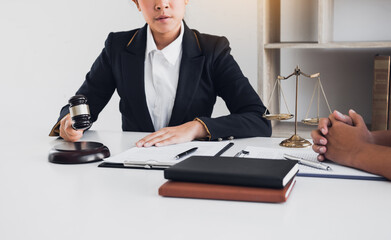 Woman judge is currently advising clients on their requests for legal proceedings and legal advice.
