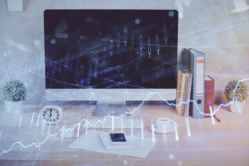 Forex graph hologram on table with computer background. Double exposure. Concept of financial markets.