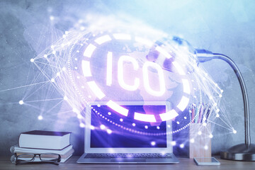 Double exposure of blockchain and crypto economy theme hologram and table with computer background....