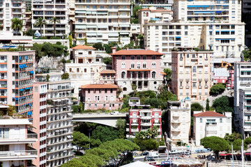 View of the Principality of Monaco: hot sunny summer day, colorful architecture of the buildings