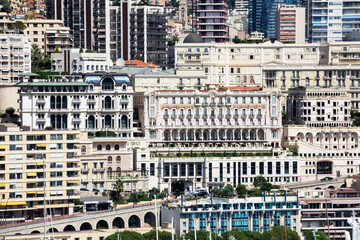 View of the Principality of Monaco: hot sunny summer day, colorful architecture of the buildings