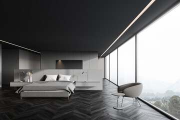 Grey panoramic master bedroom with armchair