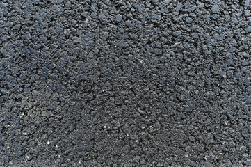 Texture of the road surface. New asphalt concrete
