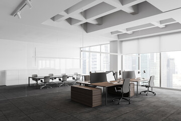 Grey and white office corner with meeting room