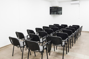 Interior of meeting room with TV in moder office