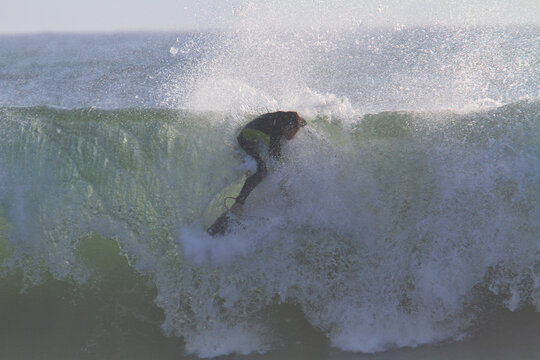 A day at the beach surfing Rincon California
