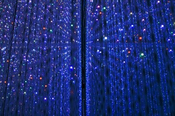Naklejka na ściany i meble Dark blue and light blue lights forming a tunnel