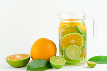 Fototapeta na wymiar Bottle of detox water made from citrus fruits. Concept for dieting