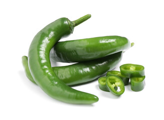 Cut and whole green hot chili peppers on white background