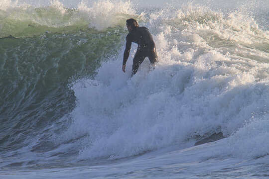 A day at the beach surfing Rincon California