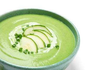 Tasty homemade zucchini cream soup isolated on white, closeup