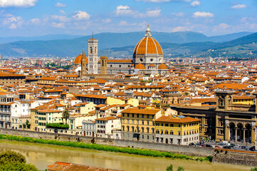 Fototapeta na wymiar It's Cathedral of Santa Maria del Fiore in Tuscany, Florence, Italy. View from the Michelangelo Square