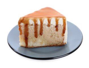 Slice of delicious cake with caramel sauce isolated on white