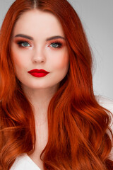 Obraz premium Beautiful Woman with Red Hair
