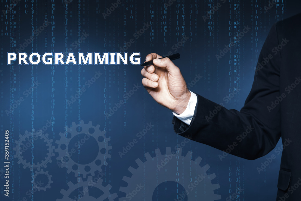 Poster businessman pointing at word programming on virtual screen, closeup