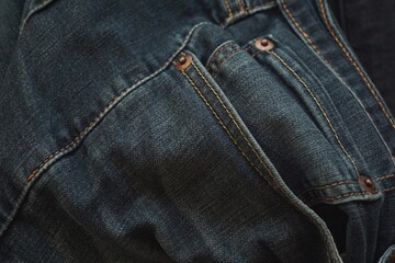 Close up of blue jeans pants fabric.