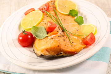 fish fillet with tomato and basil