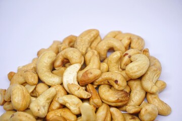 Close up of cashew nuts with white backgorund.