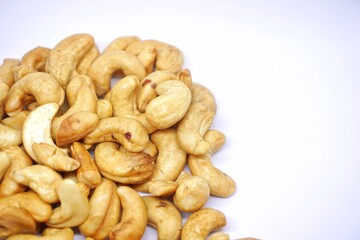 Close up of cashew nuts with white backgorund.