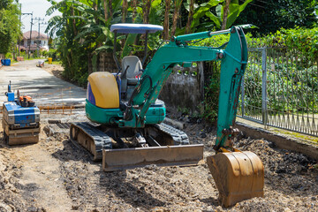 excavator loader machine at demolition construction site
