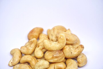 Close up of cashew nuts with white backgorund.