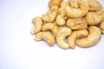 Close up of cashew nuts with white backgorund.