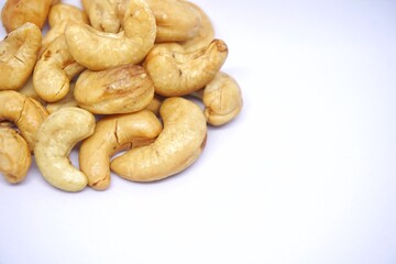 Close up of cashew nuts with white backgorund.