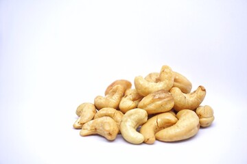Close up of cashew nuts with white backgorund.