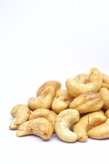 Close up of cashew nuts with white backgorund.