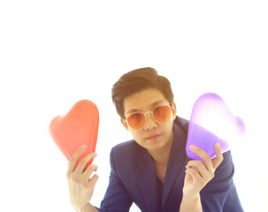 Asian professional pride tomboy lesbian with suit and hearts balloons