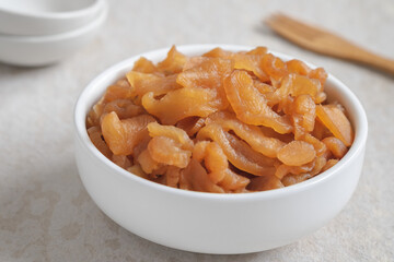 Pickle turnip in white bowl.